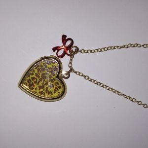 Heart shaped cheeta print locket necklace